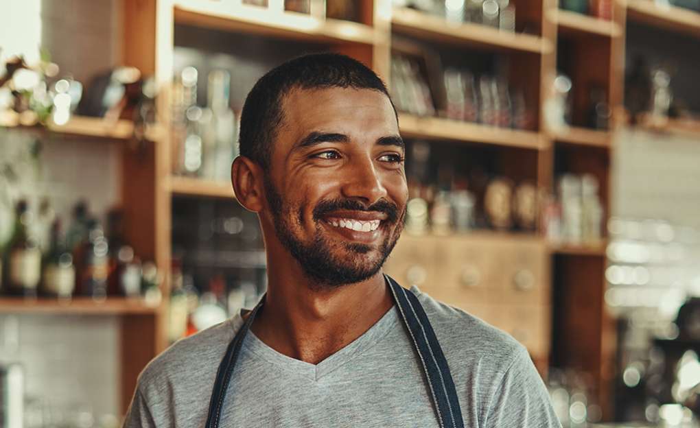 man smiling in store